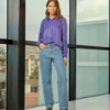 blusa azul botão coração